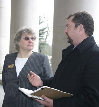 San Juan County Councilman Kevin Ranker talks with Friday Harbor Town Councilwoman Liz Illg about ferry funding issues during a lobbying trip to Olympia. Come January