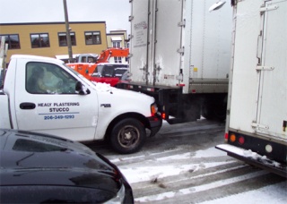Ron Bates caught this mishap at the Friday Harbor ferry landing Wednesday morning (11:10 a.m. sailing). 'Looks like the white Ford pick-up couldn't stop and rear-ended the large semi truck