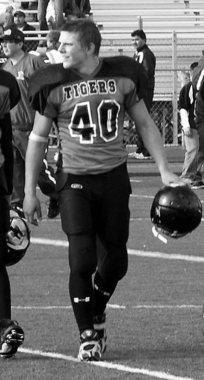 Nate Steenkolk ... injured his neck as he caught a C.J. Woods pass for a touchdown