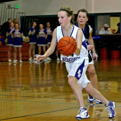 Friday Harbor point guard Mandy Turnbull scored a season-high eight points in the Wolverines 43-24 win Saturday at University Prep. Left