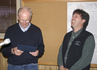 Mayor David Jones presents outgoing Councilman Kelley Balcomb-Bartok with a proclamation declaring today 'Kelley Balcomb-Bartok Day' in Friday Harbor. Balcomb-Bartok has resigned after one year and five months on the council to take a job in Renton.