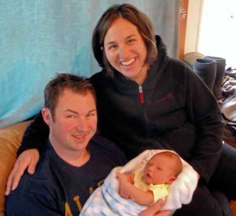 Brigham William Jones of Decatur Island poses for a first picture with his parents