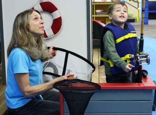 Cathy Kromer joins in the fun at A Place to Play on Spring Street.