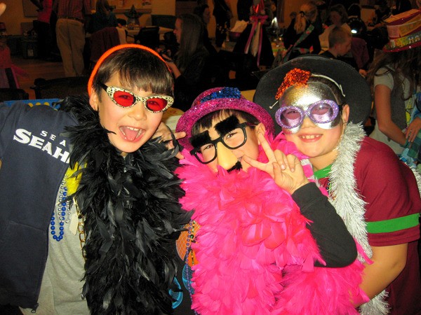 A photo booth and hat making contest are some popular activities at the New Year's Event