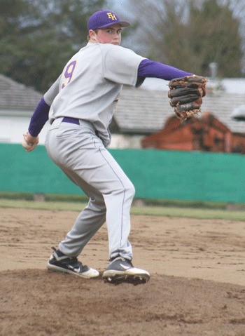 Friday Harbor southpaw Austin Lambright unleashes a strike in the Wolverines 19-1 win over Cedar Park Christian