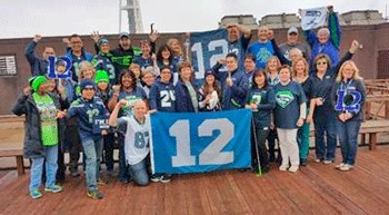 Washington state ferries' workers show off their 12th Man spirit on the eve of Super Bowl Sunday.
