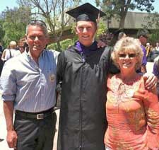 Flanked by parents Jerry and Jody
