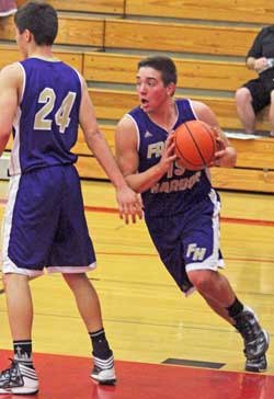 Friday Harbor's C.J. Woods moves the ball up court in the Wolverines 62-55 win on the road Jan. 22 at Coupeville. Woods scored a game-high 31 points.