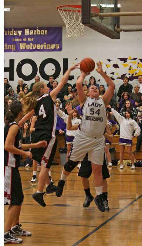 Friday Harbor senior Kelsey Barnes drops in two of her game-high 19 points in the Wolverines 53-46 loss to Division 2A Mount Baker Tuesday in Turnbull Gym.