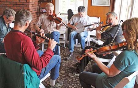 Above; the lobby of Hotel de Haro hosts an impromptu jam session during the annual Irish Music Retreat