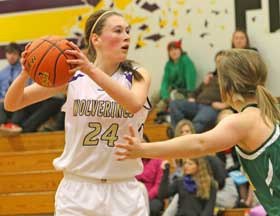 Maddie Kincaid looks inside for an open teammate in a December game against Darrington in Turnbull Gym.
