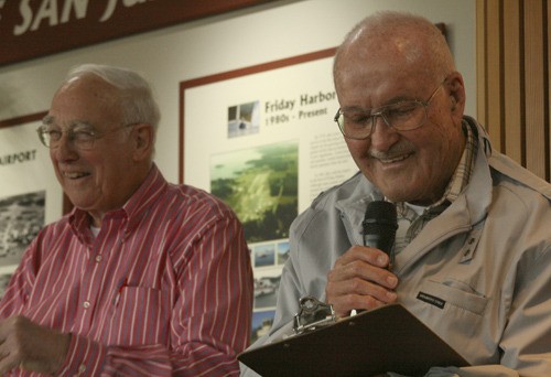 Left; Dr. John Geyman and fellow aviator and good friend Frank Brame share a laugh
