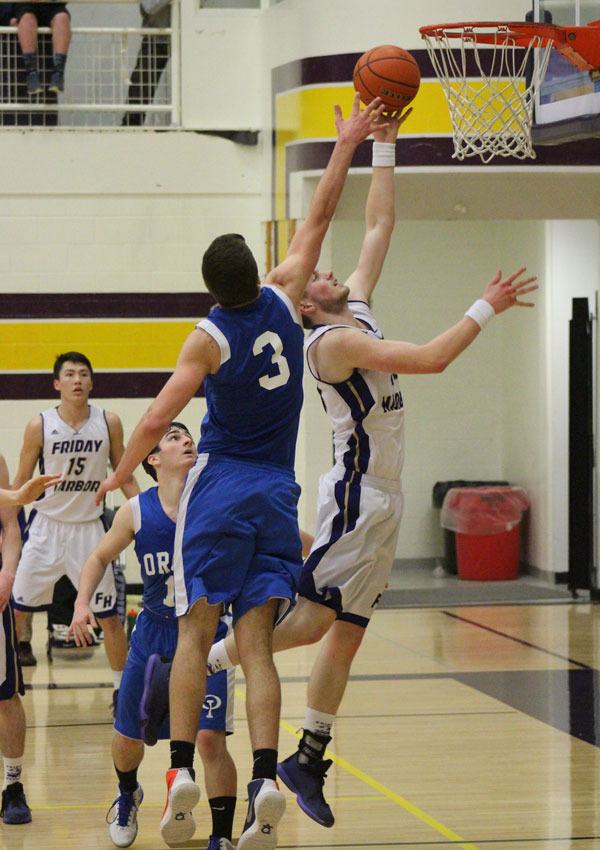 Friday Harbor Wolverines beat the Orcas Vikings in the first district play-off game last night