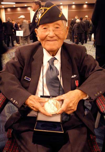 Friday Harbor's Roy Matsumoto displays his Congressional medal of honor.