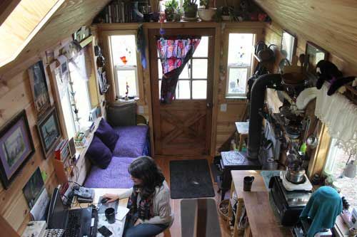 Peggy Mauro in her tiny home on San Juan Island. Her house was custom built on a double-axel trailer for $16