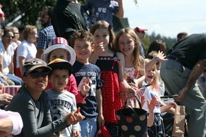 Excited onlookers for the annual 4th of July parade in downtown Friday Harbor.