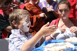 Pie eating contest at Pig War Picnic on July 4