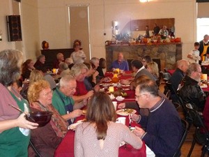 Islanders enjoy holiday dinner and the company of other islanders at the 2013 Community Thanksgiving Day dinner