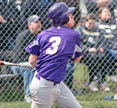 Friday Harbor senior Charles Nash looks on as the first home run of his high school career takes flight in the Wolverines 8-5 come-from-behind win