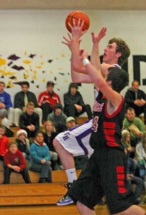 Friday Harbor senior Otis Cooper-West and company will open the 2013-14 season at home