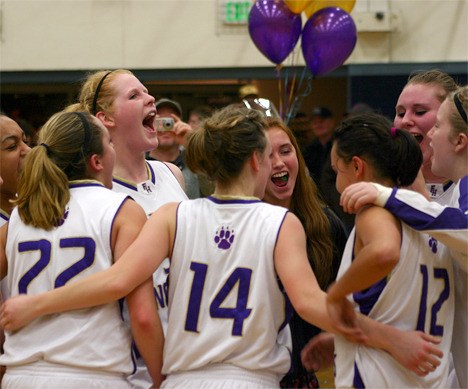 The Friday Harbor Wolverines celebrate their 41-27 victory over Mount Vernon Christian