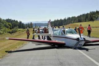 No one was injured when this 1980 Beech Bonanza landed with its landing gear up Friday afternoon at Roche Harbor Airfield. The next day