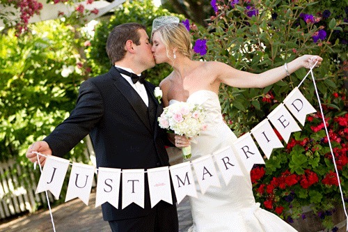 Newlyweds Evan and Mandy celebrated their marriage with a kiss and