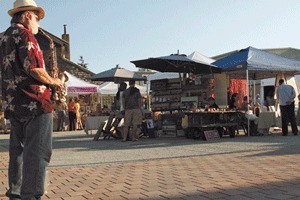 Shadows grow as the summer sun sets on the Brickworks Plaza in Friday Harbor's Sunshine Alley.