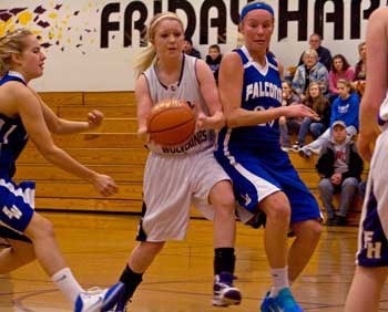 Friday Harbor's Jean Melborne drives the lane in the Wolverines 41-35 season-opening victory