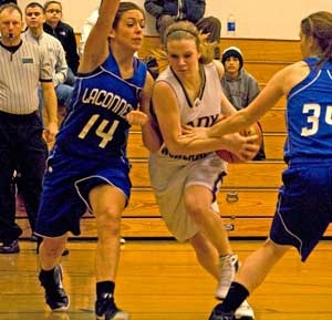 Point guard Mandy Turnbull heads to the hoop against La Conner's Kelley McClung