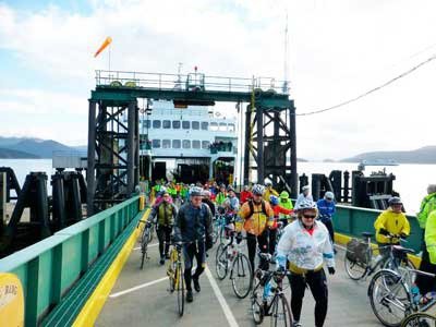 Pedal power: bicyclists disembark a ferry at Lopez Island on the morning of the 2014 Tour de Lopez.