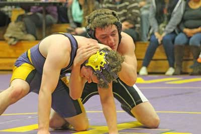 Ben Ware takes firm control of a Concrete opponent en route to a win in the Wolverines Dec. 10 four-team league match at home.