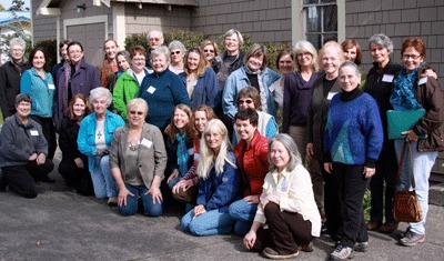 Graduates of WSU Extension's most recent Master Gardeners eight-week course pose for a group photo outside the Grange Hall in Friday Harbor.
