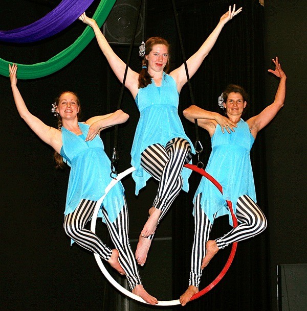 Assistants and aerial acrobatic performers Maria Bullock