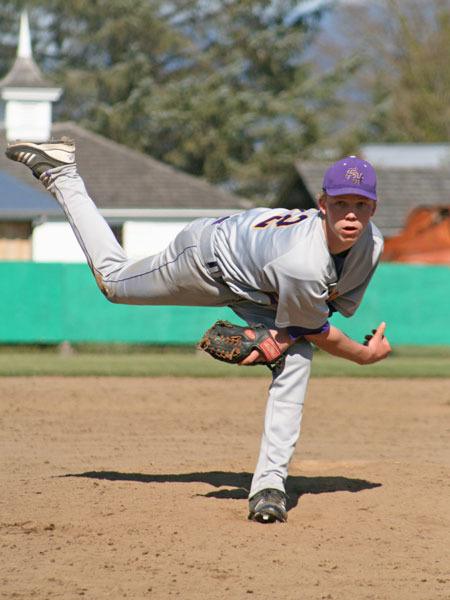 Sophomore Gabe Lawson follows through with a high leg kick in a March 30 match up against Nooksack Valley at Hartman Field.