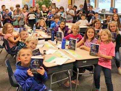 Friday Harbor Elementary School students show off their new dictionaries