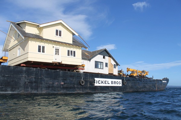 Two of the three houses barged in by the Nickel Brothers for San Juan Community Home Trust on Aug. 19
