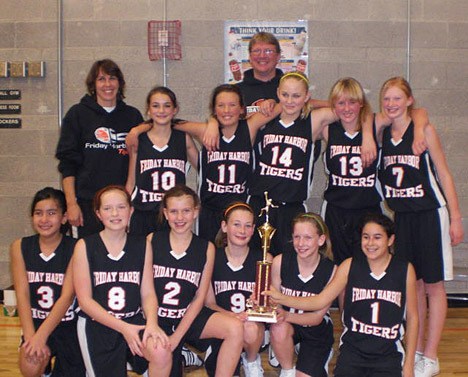 The Friday Harbor Tigers won the Fifth and Sixth Grade SWISH League Championship. Front from left