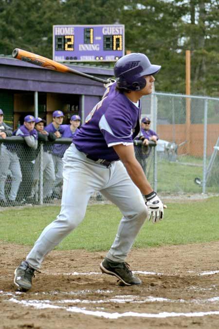 Senior Roy Taylor delivers the game-winning RBI in the Wolverines 4-1 win Tuesday at Granite Falls.