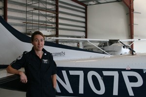 Jackie Hamilton dons her air ambulance flight suit for a tour of the hangar and the fleet of aircraft of Island Air.