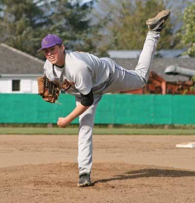 Friday Harbor's Austin Lambright delivers a pitch in the Wolverines post-season opener