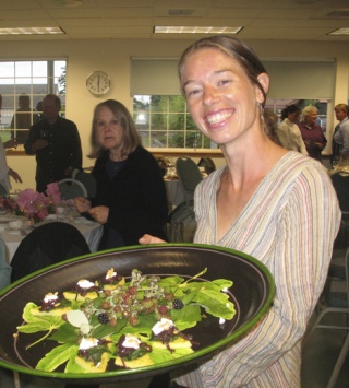 Amanda Kendall holds a platter of locally produced goods at the San Juan County Agricultural Guild fund-raiser
