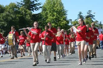 The Community Marching Band winds its way down Spring Street while performing in the 2012 Friday Harbor Fourth of July Day Parade.