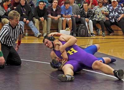 Friday Harbor senior Willy Dunn claimed a berth in the state Mat Classic by finishing third in the heavyweight division of the Northwest 1A wrestling regionals