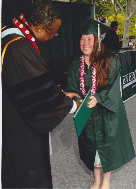Claire Burke of Friday Harbor is presented with her liberal arts degree by Evergreen State College President Dr. Les Purce.