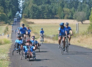 Riders with the Wounded Warrior Project 'Soldier Ride' travel False Bay Road during a 2012 tour of San Juan Island.