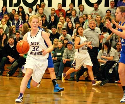 Friday Harbor's Maggie Andersen drives to the hoop in the Wolverines victory at home over Orcas early in the season.  Andersen