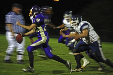 A Friday Harbor player races with the football during the Homecoming game against Lynden Christian.