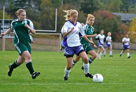 Friday Harbor's Elle Guard scored the Wolverines' only goal and put the team out in front early in a 3-1 loss to Meridian Thursday at the District 1 playoffs. Above