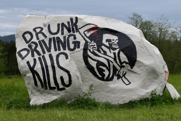 A somber depiction highlighting the Every 15 Minutes program decorates the 'Rock' on Beaverton Valley Road
